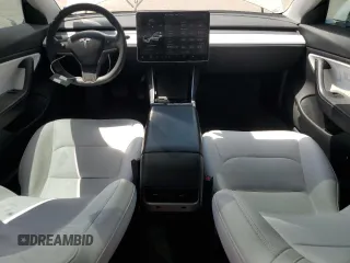 2020 Tesla Model 3 Standard Range Plus with VIN 5YJ3E1EA5LF599280, listed as a Copart auction lot 52383295 with 58,506 mi miles and Salvage Title. Bid and sale history available at DreamBid. Image 8.