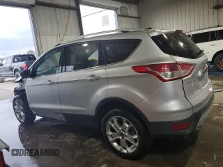 2014 Ford Escape Titanium с VIN 1FMCU0J98EUA35069, выставлен на аукционе Copart как лот 58369635 с пробегом 92 323 миль миль и Списание • Salvage title. История ставок и продаж доступна на DreamBid. Изображение 2.