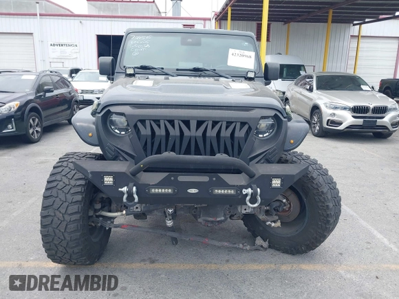 2020 Jeep Gladiator Rubicon z VIN 1C6JJTBG7LL102189, wystawiony jako IAAI lot #42320968 z przebiegiem 68 266 mil mil oraz . Historia ofert i sprzedaży dostępna na DreamBid. Obrazek 12.