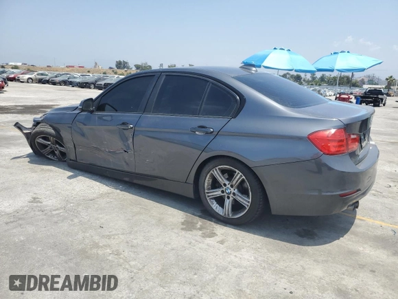 2015 BMW 3 Series 328i with VIN WBA3A5G5XFNS86943, listed as a Copart auction lot 57620325 with 154,165 mi miles and Salvage title. Bid and sale history available at DreamBid. Image 2.
