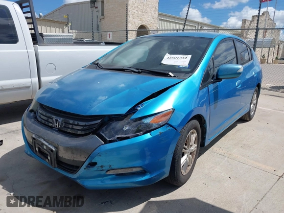 2010 Honda Insight EX with VIN JHMZE2H71AS003290, listed as a IAAI auction lot 42601332 with 163,510 mi miles and . Bid and sale history available at DreamBid. Image 2.
