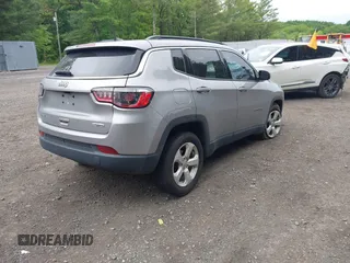 2021 Jeep Compass Latitude with VIN 3C4NJDBBXMT569861, listed as a IAAI auction lot 42325006 with 83,153 mi miles and . Bid and sale history available at DreamBid. Image 4.