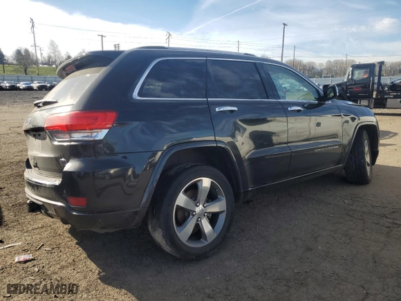 2014 Jeep Grand Cherokee Overland with VIN 1C4RJFCG8EC437489, listed as a Copart auction lot 41781595 with 174,862 mi miles and Salvage Title. Bid and sale history available at carsss.com. Image 3.