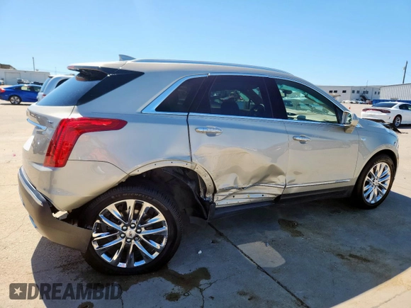 2017 Cadillac XT5 Platinum AWD z VIN 1GYKNFRS0HZ111747, wystawiony jako Copart lot #57666415 z przebiegiem 72 632 mil mil oraz Szkoda całkowita • Salvage title. Historia ofert i sprzedaży dostępna na DreamBid. Obrazek 3.