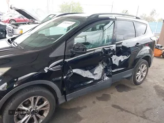 2018 Ford Escape SEL with VIN 1FMCU0HD6JUA86266, listed as a IAAI auction lot 42031613 with 72,798 mi miles and . Bid and sale history available at carsss.com. Image 6.