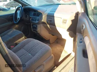 2001 Toyota Sienna LE with VIN 4T3ZF13C21U402424, listed as a IAAI auction lot 41707228 with 259,327 mi miles. Bid and sale history available at carsss.com. Image 5.