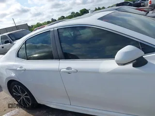 2018 Toyota Camry LE z VIN 4T1B11HK5JU623766, wystawiony jako IAAI lot #41997511 z przebiegiem 146 569 mil mil oraz . Historia ofert i sprzedaży dostępna na DreamBid. Obrazek 13.