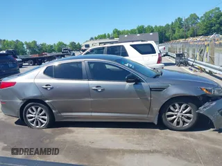 2015 Kia Optima LX z VIN 5XXGM4A7XFG508280, wystawiony jako IAAI lot #42116240 z przebiegiem 221 269 mil mil oraz . Historia ofert i sprzedaży dostępna na DreamBid. Obrazek 14.
