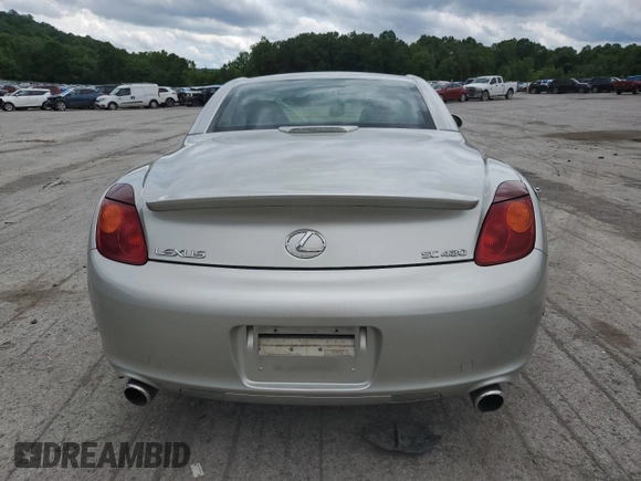 2002 Lexus SC 430 with VIN JTHFN48Y420018791, listed as a Copart auction lot 61790145 with 130,872 mi miles and Salvage title. Bid and sale history available at DreamBid. Image 6.