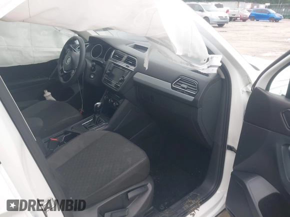 2018 Volkswagen Tiguan S with VIN 3VV1B7AX1JM032250, listed as a IAAI auction lot 42366790 with 65,406 mi miles and . Bid and sale history available at DreamBid. Image 5.