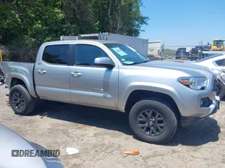 2023 Toyota Tacoma SR with VIN 3TYCZ5AN2PT141576, listed as a IAAI auction lot 42492127 with 43,431 mi miles and . Bid and sale history available at DreamBid. Image 14.