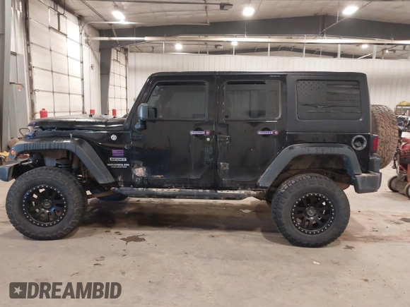 2017 Jeep Wrangler Unlimited Sport with VIN 1C4BJWDGXHL698014, listed as a IAAI auction lot 41384325 with 121,402 mi miles. Bid and sale history available at carsss.com. Image 15.