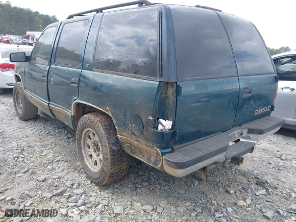 1995 Chevrolet Tahoe with VIN 1GNEK13K3SJ412971, listed as a IAAI auction lot 41940461 with 425,128 mi miles. Bid and sale history available at carsss.com. Image 3.