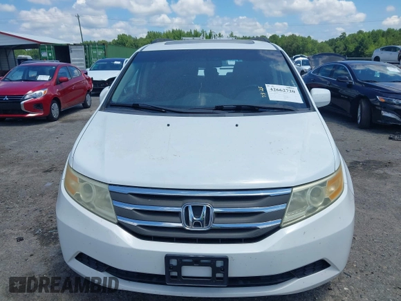 2011 Honda Odyssey EX-L with VIN 5FNRL5H6XBB002461, listed as a IAAI auction lot 42662720 with 145,672 mi miles and . Bid and sale history available at DreamBid. Image 12.