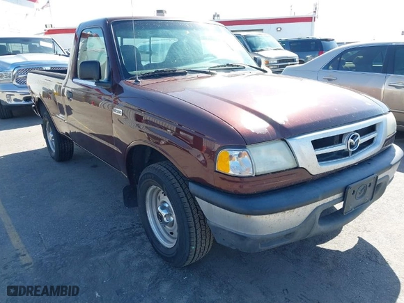 2003 Mazda B-Series 2WD Truck SX with VIN 4F4YR12D03TM09575, listed as a IAAI auction lot 41693387 with 173,882 mi miles. Bid and sale history available at carsss.com. Image 1.