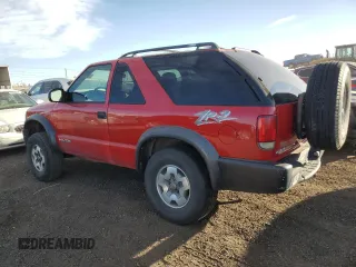 2004 Chevrolet Blazer LS z VIN 1GNCT18X34K141674, wystawiony jako Copart lot #85500954 z przebiegiem Nie podano mil oraz Czysty tytuł • Clean title. Historia ofert i sprzedaży dostępna na DreamBid. Obrazek 2.