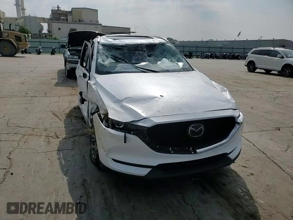 2021 Mazda CX-5 Touring with VIN JM3KFACM1M0405129, listed as a Copart auction lot 67874724 with 49,618 mi miles and Salvage Title. Bid and sale history available at carsss.com. Image 12.