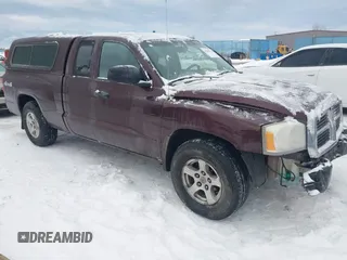 2005 Dodge Dakota SLT with VIN 1D7HW42N65S305733, listed as a IAAI auction lot 41289814 with 149,226 mi miles and . Bid and sale history available at carsss.com. Image 1.