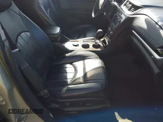 2013 Chevrolet Traverse LTZ z VIN 1GNKVLKD1DJ202428, wystawiony jako IAAI lot #42134820 z przebiegiem 126 532 mil mil oraz . Historia ofert i sprzedaży dostępna na DreamBid. Obrazek 5.