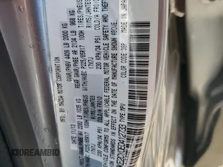 2014 Mazda CX-5 Touring z VIN JM3KE2CY0E0412733, wystawiony jako Copart lot #55803865 z przebiegiem 161 539 mil mil oraz Szkoda całkowita • Salvage title. Historia ofert i sprzedaży dostępna na DreamBid. Obrazek 13.