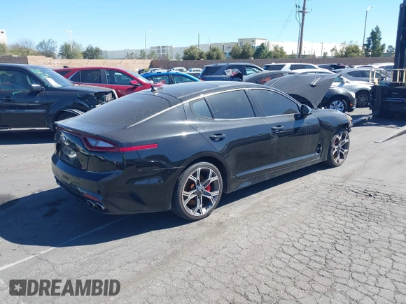 2018 Kia Stinger GT2 with VIN KNAE55LC9J6016753, listed as a IAAI auction lot 41408216 with 117,268 mi miles. Bid and sale history available at carsss.com. Image 4.