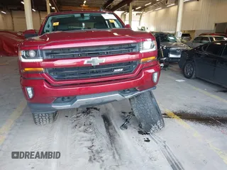 2018 Chevrolet Silverado 1500 LT with VIN 3GCUKREC0JG580317, listed as a IAAI auction lot 41868522 with 75,738 mi miles. Bid and sale history available at carsss.com. Image 17.