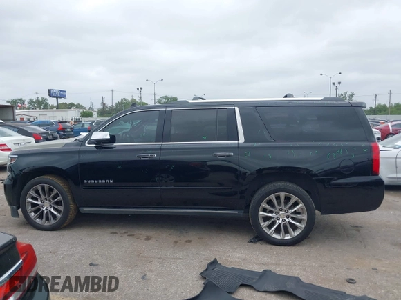 2019 Chevrolet Suburban Premier with VIN 1GNSKJKJ3KR231852, listed as a IAAI auction lot 41957728 with 136,263 mi miles and . Bid and sale history available at DreamBid. Image 14.