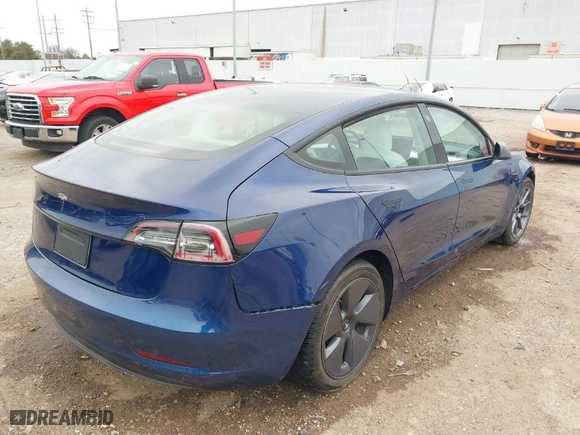 2023 Tesla Model 3 with VIN 5YJ3E1EA2PF384249, listed as a IAAI auction lot 41357875 with 1 mi miles. Bid and sale history available at carsss.com. Image 4.