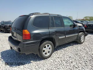 2004 GMC Envoy SLT with VIN 1GKDT13S842421586, listed as a Copart auction lot 51936515 with 188,977 mi miles and Salvage title. Bid and sale history available at DreamBid. Image 3.