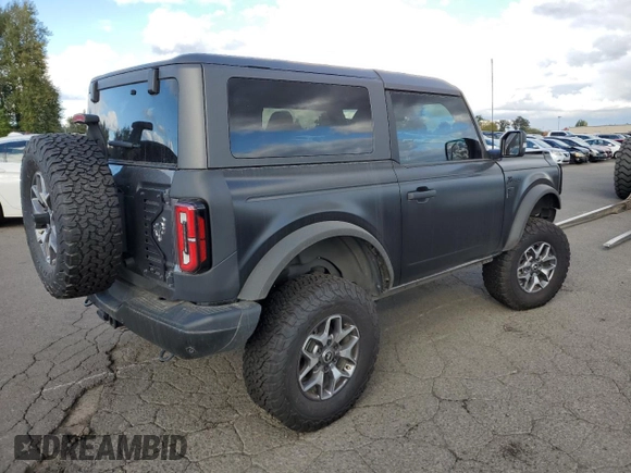 2023 Ford Bronco with VIN 1FMDE5CP1PLA92944, listed as a Copart auction lot 66625304 with 115,179 mi miles and Salvage title. Bid and sale history available at DreamBid. Image 3.