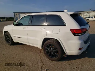 2017 Jeep Grand Cherokee Altitude with VIN 1C4RJEAG9HC702812, listed as a Copart auction lot 62423495 with 162,982 mi miles and Salvage title. Bid and sale history available at DreamBid. Image 2.