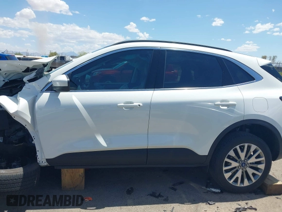 2022 Ford Escape Titanium z VIN 1FMCU9J97NUB89504, wystawiony jako IAAI lot #42571833 z przebiegiem Nie podano mil oraz . Historia ofert i sprzedaży dostępna na DreamBid. Obrazek 14.
