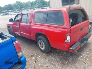 2000 Dodge Dakota Sport with VIN 1B7GL2AN7YS607119, listed as a IAAI auction lot 42377808 with 287,892 mi miles and . Bid and sale history available at DreamBid. Image 3.
