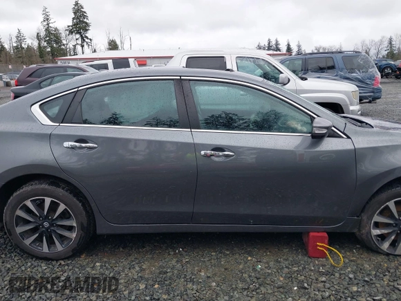 2017 Nissan Altima SV with VIN 1N4AL3AP3HC489387, listed as a IAAI auction lot 41665718 with 65,873 mi miles and . Bid and sale history available at DreamBid. Image 13.