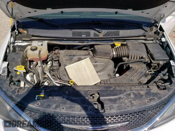 2020 Chrysler Pacifica Touring L with VIN 2C4RC1BG7LR125649, listed as a Copart auction lot 57873365 with 117,114 mi miles and Salvage title. Bid and sale history available at DreamBid. Image 12.