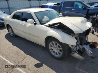 2009 Chrysler 300 Touring with VIN 2C3LA53V69H553621, listed as a Copart auction lot 70569634 with 141,157 mi miles and Salvage Title. Bid and sale history available at carsss.com. Image 4.
