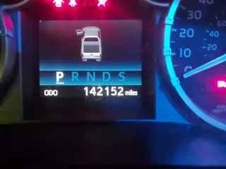 2014 Toyota Tundra 2WD Truck SR with VIN 5TFRY5F15EX166929, listed as a IAAI auction lot 41458810 with 142,152 mi miles. Bid and sale history available at carsss.com. Image 7.