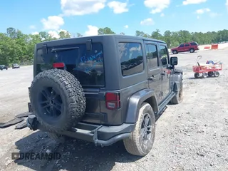 2017 Jeep Wrangler Unlimited Sahara with VIN 1C4BJWEG4HL605213, listed as a IAAI auction lot 42247221 with 104,542 mi miles and . Bid and sale history available at DreamBid. Image 4.