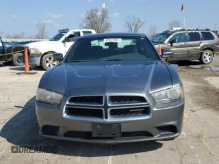 2011 Dodge Charger SE with VIN 2B3CL3CG7BH584699, listed as a Copart auction lot 52821065 with 162,879 mi miles and Clean Title. Bid and sale history available at carsss.com. Image 5.