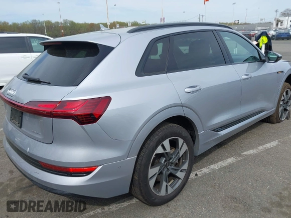 2022 Audi e-tron Premium with VIN WA1AAAGE3NB033122, listed as a IAAI auction lot 42081343 with 36,171 mi miles and . Bid and sale history available at DreamBid. Image 4.