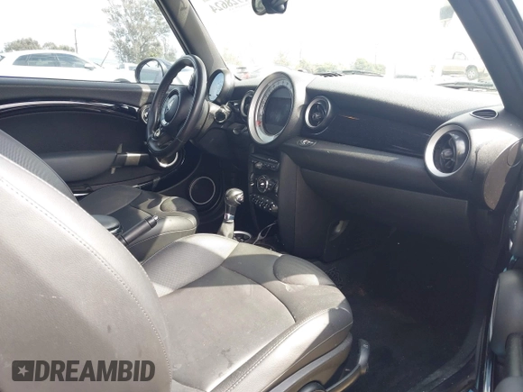2012 MINI Convertible S with VIN WMWZP3C54CT250689, listed as a IAAI auction lot 41928624 with 126,442 mi miles and . Bid and sale history available at DreamBid. Image 5.