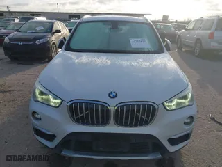 2016 BMW X1 xDrive28i with VIN WBXHT3C3XGP889461, listed as a IAAI auction lot 41757627 with 105,681 mi miles. Bid and sale history available at carsss.com. Image 6.