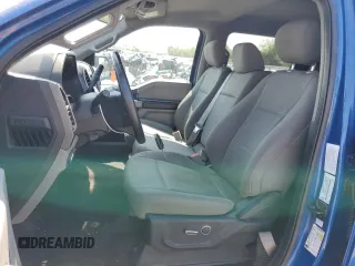 2018 Ford F-150 XL with VIN 1FTEW1EGXJKD26409, listed as a Copart auction lot 59403645 with 122,373 mi miles and Salvage title. Bid and sale history available at DreamBid. Image 7.