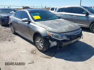 2016 Kia Optima EX with VIN 5XXGU4L31GG106854, listed as a IAAI auction lot 41762052 with 122,121 mi miles. Bid and sale history available at carsss.com. Image 1.