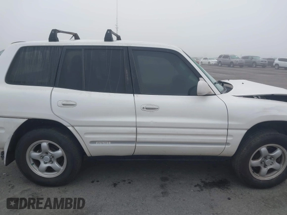 1999 Toyota RAV4 with VIN JT3GP10V0X7050334, listed as a IAAI auction lot 41607894 with 348,069 mi miles and . Bid and sale history available at DreamBid. Image 13.