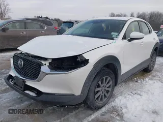 2021 Mazda CX-30 S with VIN 3MVDMBAL9MM221639, listed as a IAAI auction lot 41545920 with 57,239 mi miles and . Bid and sale history available at carsss.com. Image 2.