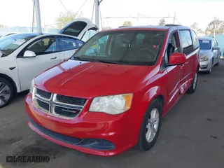 2014 Dodge Grand Caravan SXT 30th Anniversary with VIN 2C4RDGCG9ER429356, listed as a IAAI auction lot 41849654 with 100,843 mi miles. Bid and sale history available at carsss.com. Image 2.