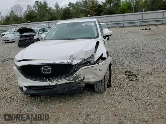 2021 Mazda CX-5 Grand Touring with VIN JM3KFBDM2M1436789, listed as a Copart auction lot 49534305 with 65,790 mi miles and Salvage Title. Bid and sale history available at carsss.com. Image 12.