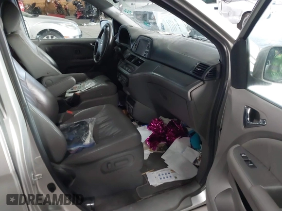 2009 Honda Odyssey Touring с VIN 5FNRL38979B005813, выставлен на аукционе IAAI как лот 41049383 с пробегом 174 897 миль миль и . История ставок и продаж доступна на DreamBid. Изображение 5.