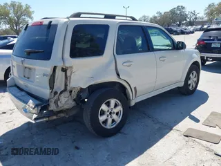 2010 Mercury Mariner с VIN 4M2CN8BG7AKJ01706, выставлен на аукционе IAAI как лот 41701667 с пробегом 96 189 миль миль и . История ставок и продаж доступна на DreamBid. Изображение 4.